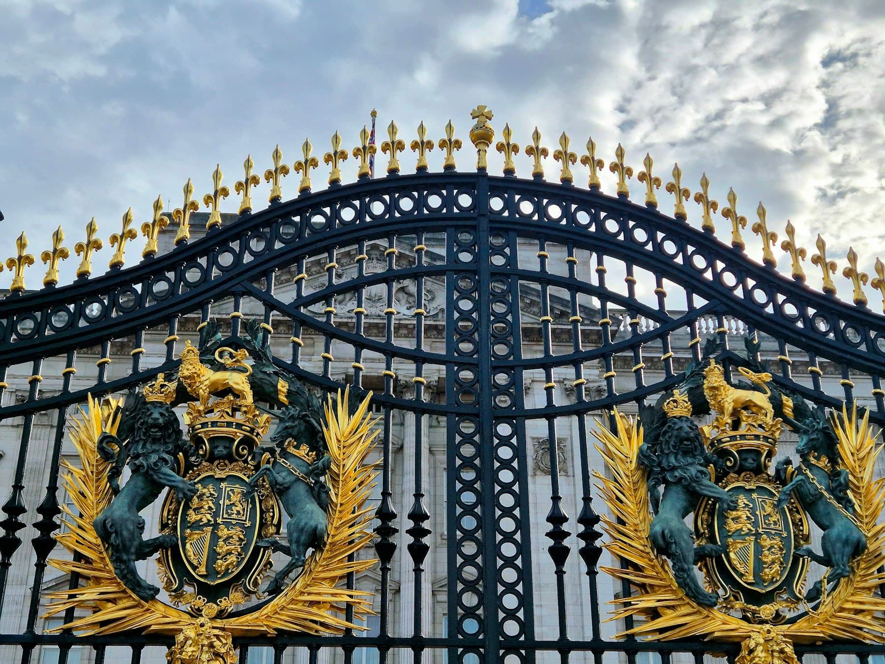 Close detail of a hand-forged gate crest